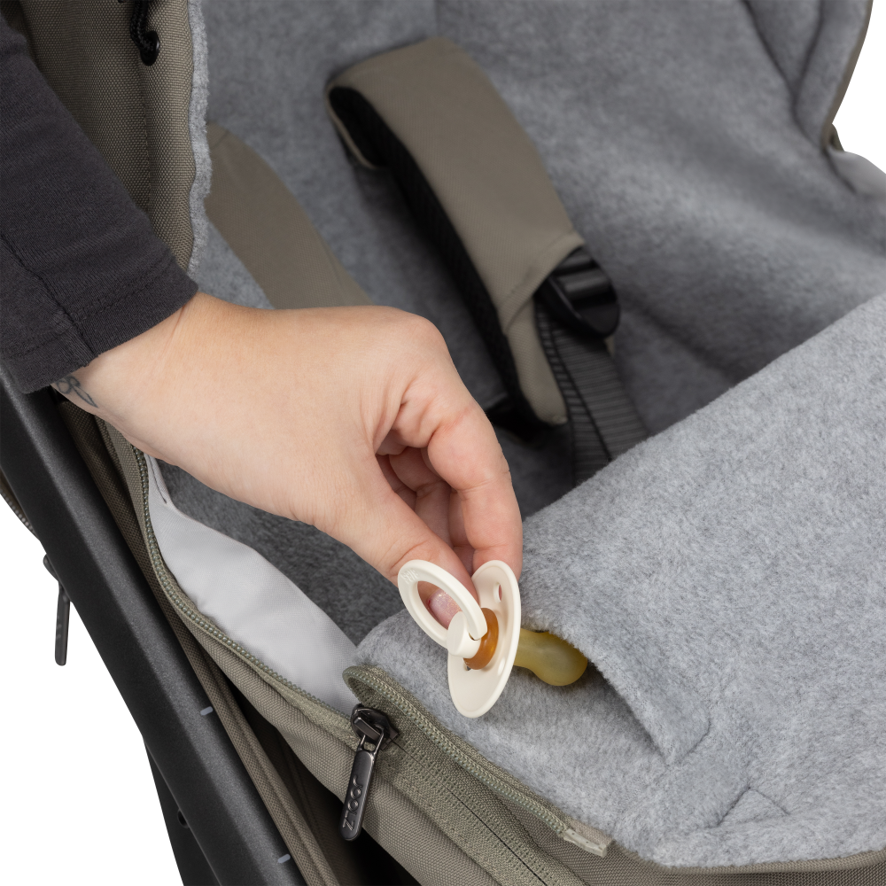 Soother/teething ring compartment